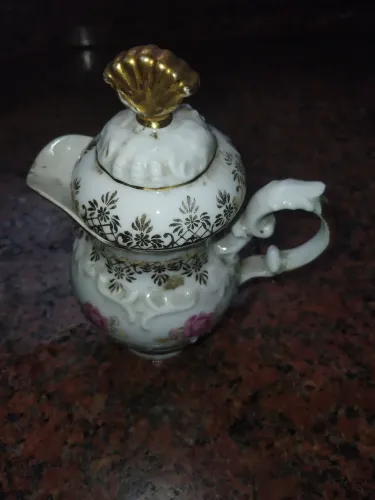 Leiteira de porcelana pequena antigo