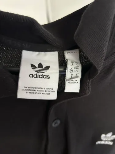 camiseta polo adidas preta