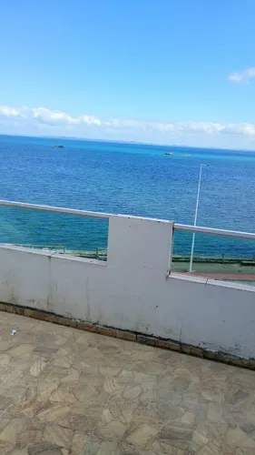 Vendo uma casa 3° andar em frente a praia.