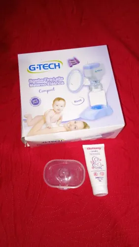Kit bomba tira leite eletrônica,com uma pomada pra seios e um bico de silicone 