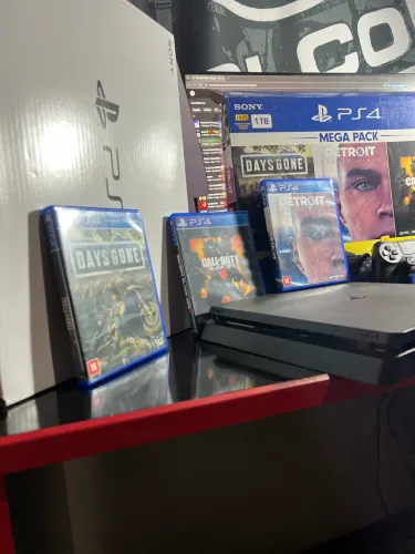 Ps4 1tb semi novo com 3 jogos de cd