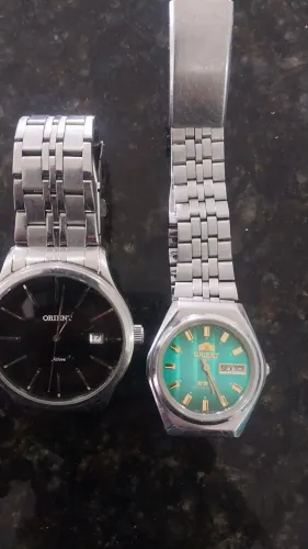 Vende-se RELÓGIO ORIENT FUNDO PRETO E OUTRO FUNDO VERDE