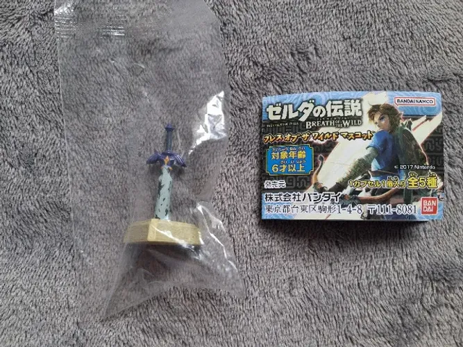 Miniatura da Master Sword do jogo The Legend of Zelda Breath of the Wild, Nintendo, Bandai