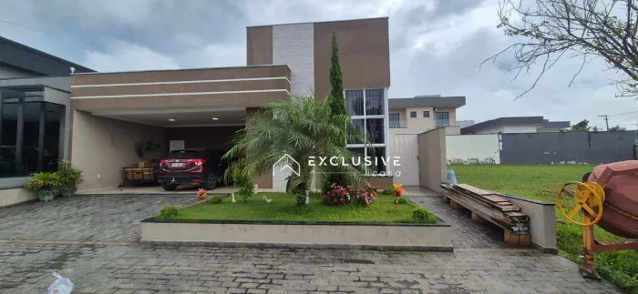 Casa com 3 dormitórios para alugar, 159 m² por R$ 7.069,00/mês - Condomínio Terras do Vale