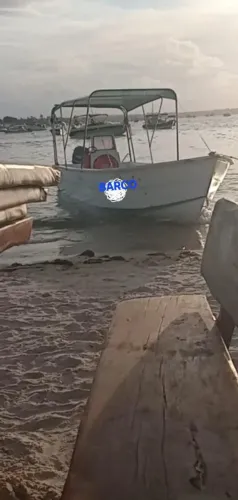 BARCO OU LANCHA DE FIBRA, ACEITO TROCAR PELO MEU LOTE EM ITAPARICA. 