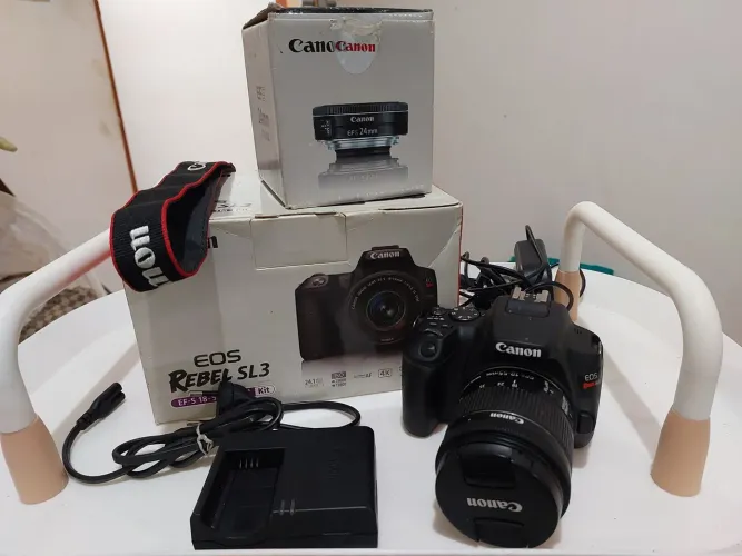 [1.844 clicks] Canon eos Rebel SL3 + 2 lentes 