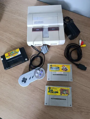 Super Nintendo.. com super Mario world e Mario kart japonês e fonte Nintendo original!