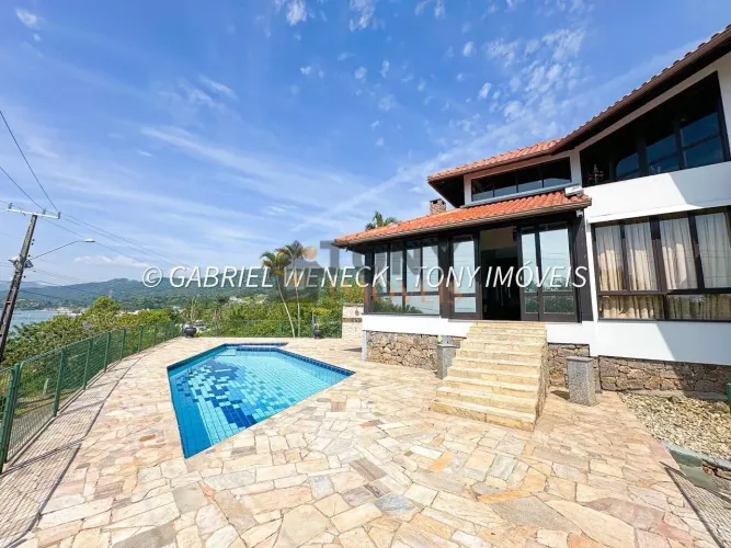 CASA EM CONDOMINIO BIGUAÇU COM 3 QUARTOS e vista mar