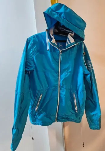 Jaqueta corta-vento Gola New Castle azul turquesa com capuz