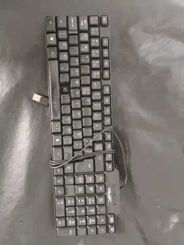 doação de teclados de computador