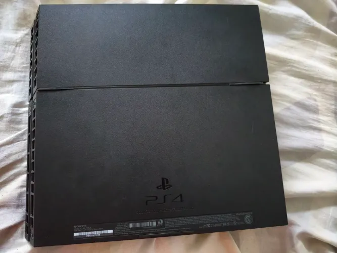 Console de ps4 modelo fat, com defeito