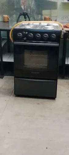 Fogão Dako  4 bocas funcionando  forno excelente vai com o registro 