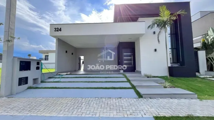 Casa no Condomínio Ouroville Taubaté | 4 Quartos, Suíte Master, Piscina e Área Gourmet