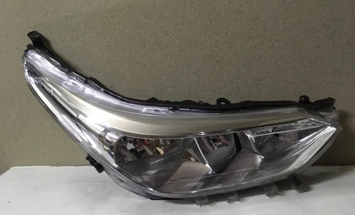 Farol Toyota Yaris (elétrico ) direto passageiro