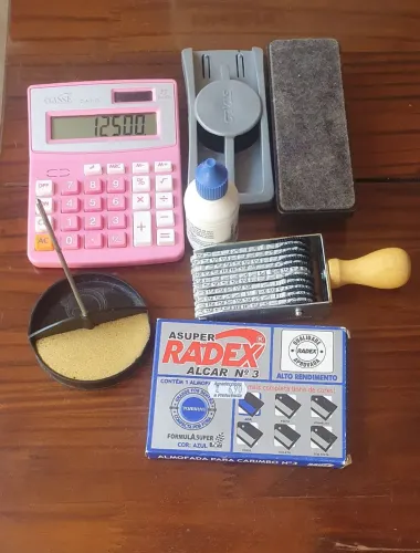 Material escritório carimbo universal calculadora e outros