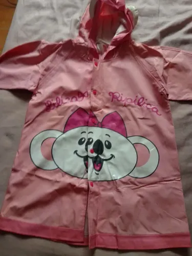 Capa chuva Lilica Ripilica material alta qualidade novinha 