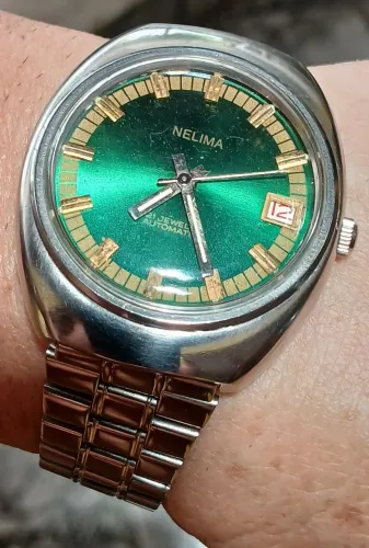 Belo e raro exemplar relógio antigo NELIMA AUTOMÁTICO INCABLOC  década de 1970  coleção 
