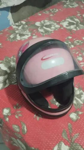 Vendo um capacete samarino rosa número 56