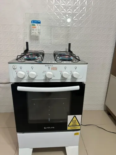 Fogão elétrico em perfeito estado frete grátis aceito cartões.
