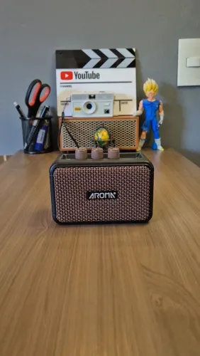 Mini Caixa amplificadora Aroma AG 04