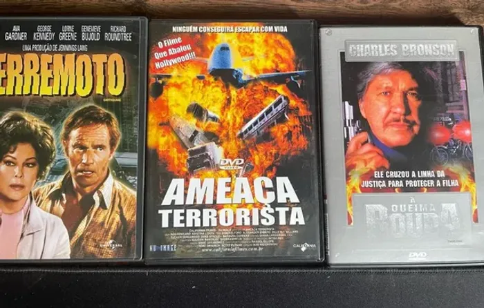 DvDs originais dos filmes: Terremoto, Ameaça Terrorista e A queima roupa. 