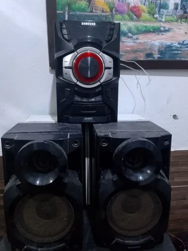 Mini system Samsung com a caixa de Panasonic