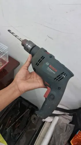 Vendo Furadeira de Impacto Bosh azul, modelo profissional usada