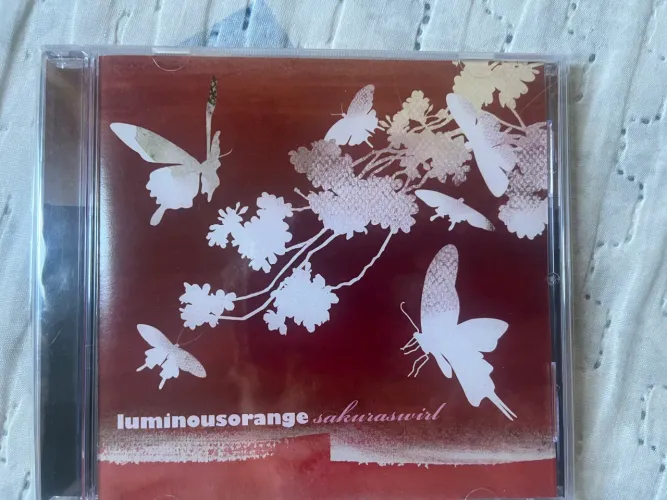 CD LuminousOrange SakuraSwirl