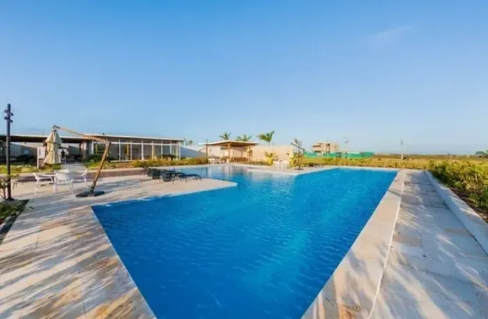 Lote com 450m² proximo ao clube e portaria, nascente e plano na Cidade Alpha Ceará