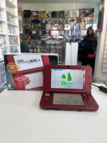 CONSOLE NINTENDO NEW 3DS XL RED DESBLOQUEADO 64GB NA CAIXA SEMINOVO - NINTENDO