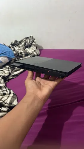 Playstation 2 slim novo poucas marcas de uso para pessoa exigentes