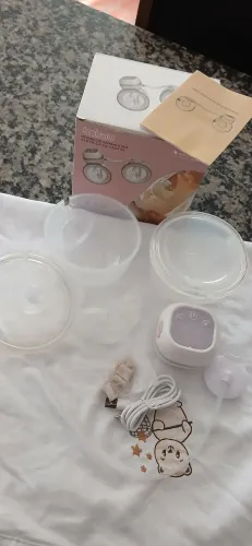 Bomba extratora de leite elétrica dupla - modelo mãos livres (praticamente nova)