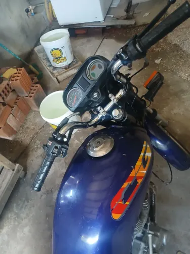 Vendo moto 99 5.000