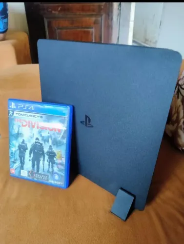 Ps4 slim inclui jogos na memória