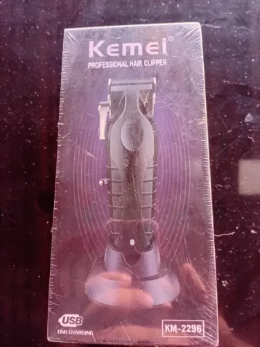 Maquina de cortar cabelo nova na caixa 