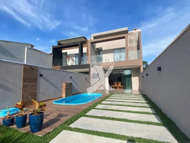 Casa com ar e piscina + 3 suítes, 142 m² - venda por R$ 900.000 ou aluguel por R$ 2.100/di