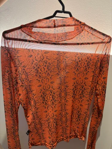 Blusa segunda pele tule animal print