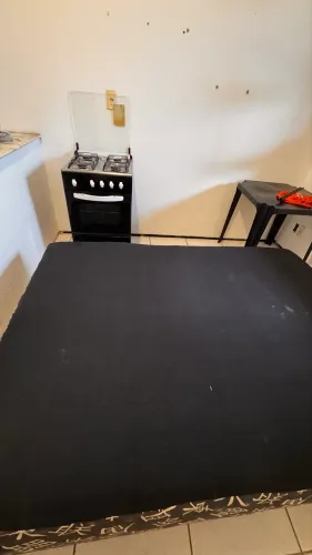 Cama de casal e fogão