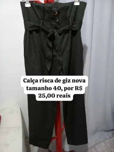 Calça social risca de giz nova.