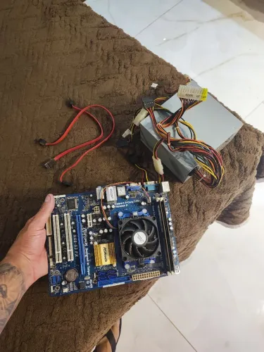 Placa mãe + fonte + memórias 