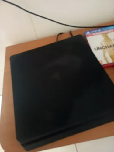 Ps4 slim de 1 tera com 15 jogos digitais e 3 física