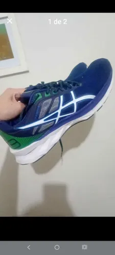 Tênis Asics muito novo numeração rara muito bonito número 48" ainda anda muito oportunida.