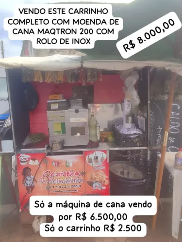 Carrinho e máquina de caldo de cana