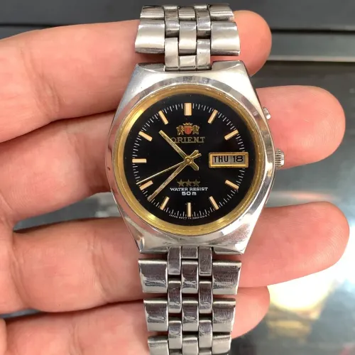 Relógio Orient 3 estrelas misto anos 90 perfeito 