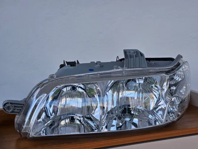 FAROL ESQUERDO NUNCA USADO 01-07 PALIO/WEKEEND/STRADA/SIENA