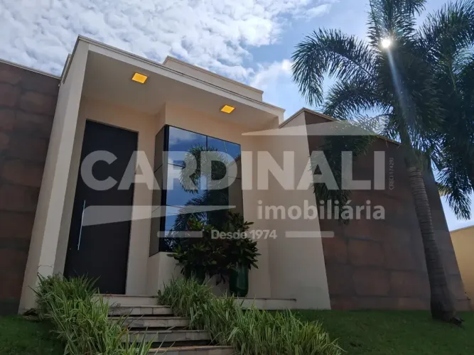 Linda casa em condomínio, com arquitetura única de esquina com acabamento de primeira qual