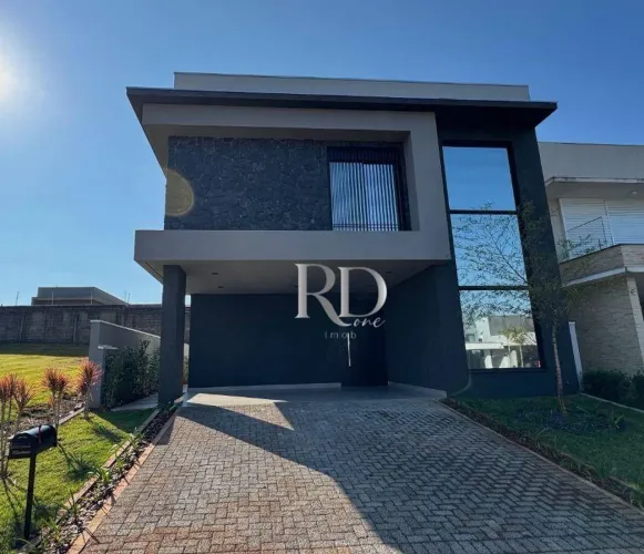 Sobrado com 3 dormitórios à venda, 217 m² por R$ 1.920.000,00 - Parque Tauá - Cond. Tangar