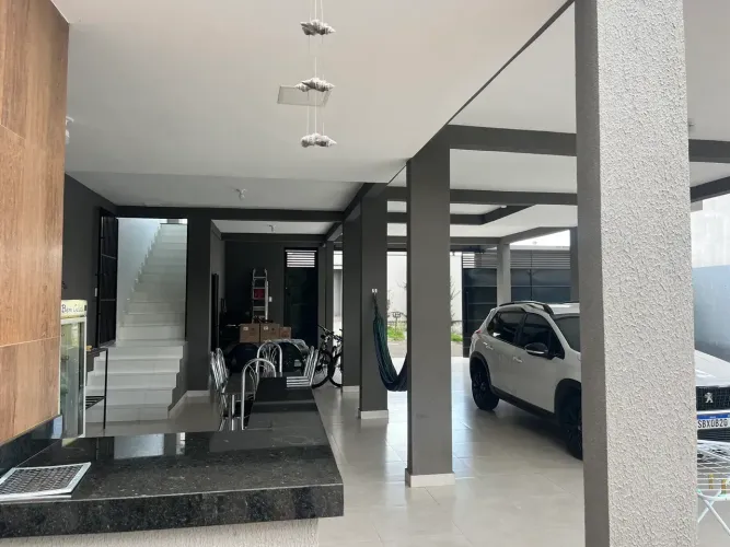 chácara muito bem localizada com pomar córrego e um ótimo Sobrado asfalto até na porta.