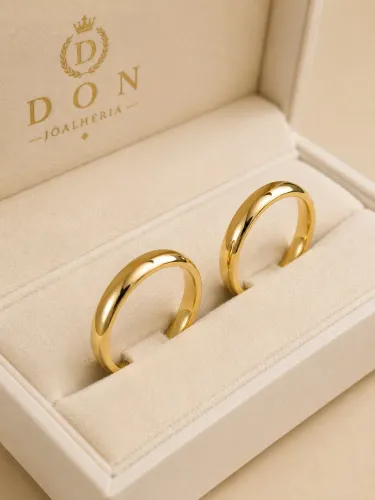 Par de Alianças Abauladas em Ouro 18k 750
