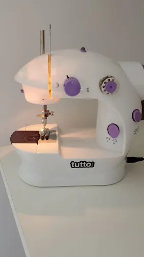 Mini máquina de costura 
